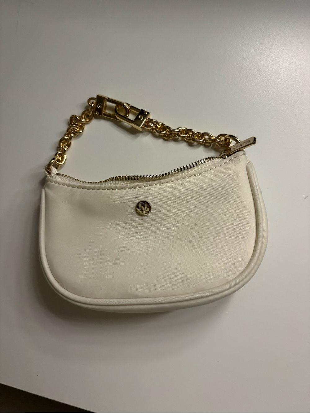 Gold-Chain Cream Wristlet Bag
